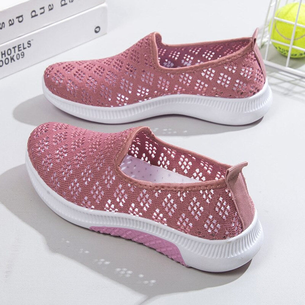 Roze dames sneakers met ademend mesh ontwerp, comfortabele witte zool. Perfect voor casual en sportieve outfits. Ideaal voor dagelijks gebruik.