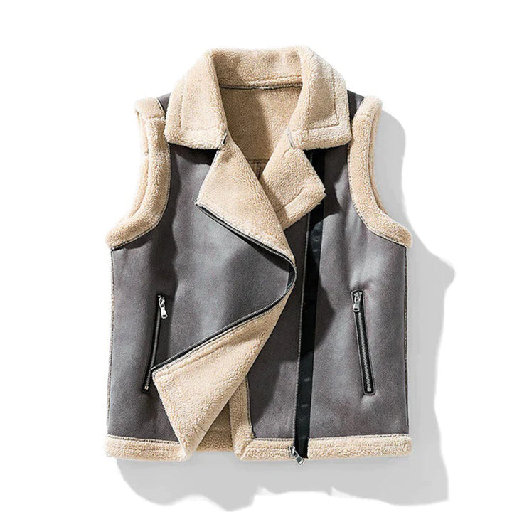 Grijze wollen bodywarmer met schapenvacht voering, asymmetrische ritssluiting en zakken. Modieuze winterkleding voor heren.