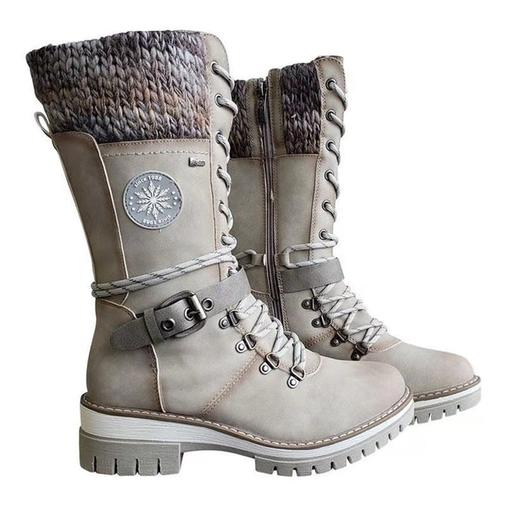 Grijze winterlaarzen met veters, gebreide kraag en stevige zool. Ideaal voor dames, warme en stijlvolle schoenen voor koude dagen.